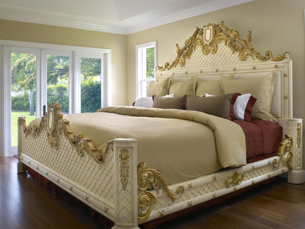Upholstered luxury bed showing detailed headboard craftsmanship